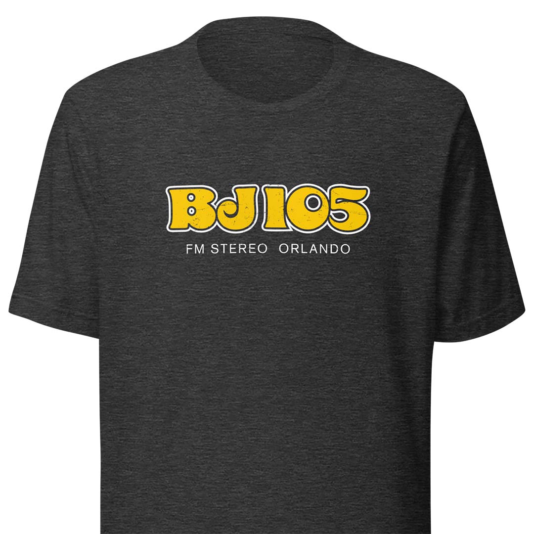 A dark heather gray crewneck t-shirt featuring a yellow and white 'BJ 105 FM STEREO ORLANDO' graphic on the chest, displayed against a solid white background.