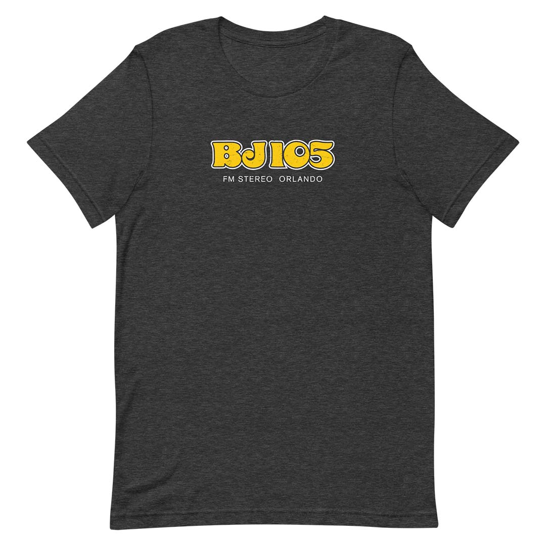 A dark heather gray crewneck t-shirt featuring a yellow and white 'BJ 105 FM STEREO ORLANDO' graphic on the chest, displayed against a solid white background.