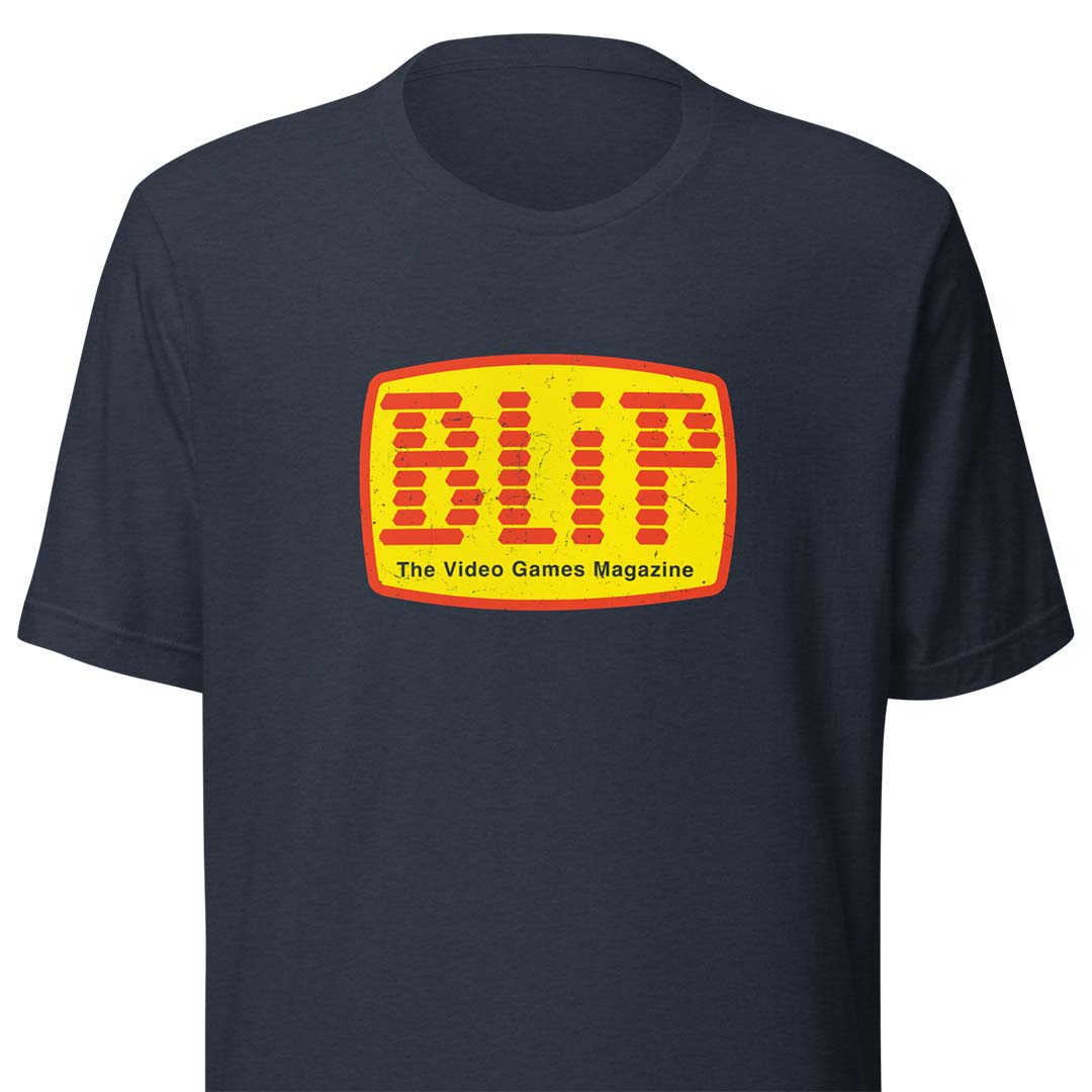 A navy blue short-sleeve t-shirt featuring a retro-style yellow and orange 'BLIP The Video Games Magazine' logo printed on the chest, shown against a plain white background.