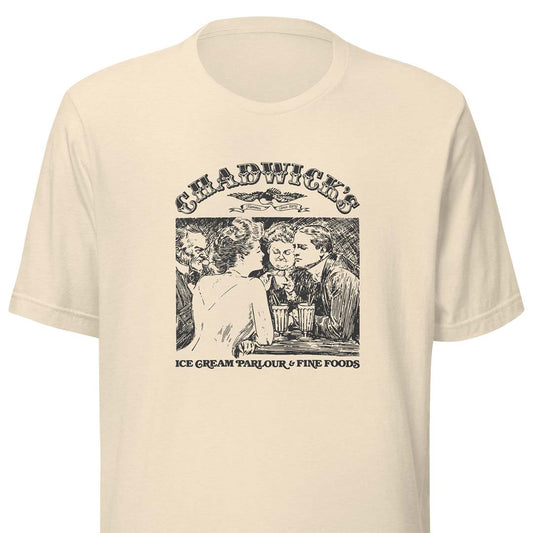 A cream-colored short-sleeve t-shirt with a black graphic print on the front. The graphic features the text 'CHADWICK'S' above an illustration of people eating ice cream, with 'ICE CREAM PARLOUR & FINE FOODS' printed below.