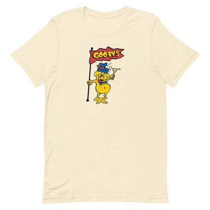 A cream-colored short-sleeve crewneck t-shirt featuring a cartoon graphic of a yellow character holding a red flag that reads 'COONY'S'.